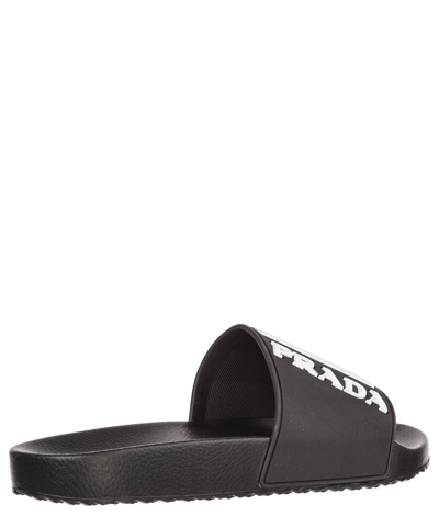 Shop Prada Slides In Black