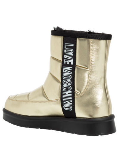 Shop Love Moschino Ankle Boots In Gold