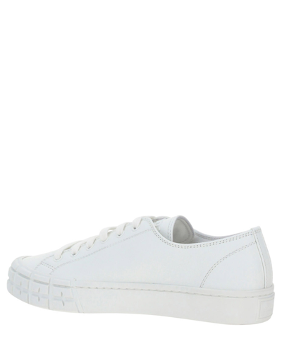 Shop Prada Cassetta Sneakers In White