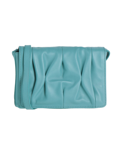Shop Coccinelle Handbags In Pastel Blue