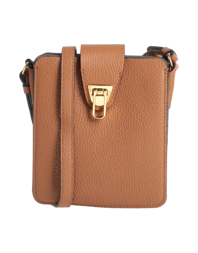 Shop Coccinelle Handbags In Tan