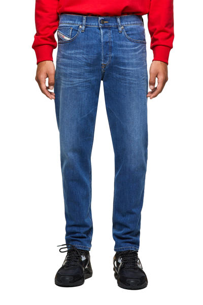 Shop Diesel Tapered Jeans In Blue