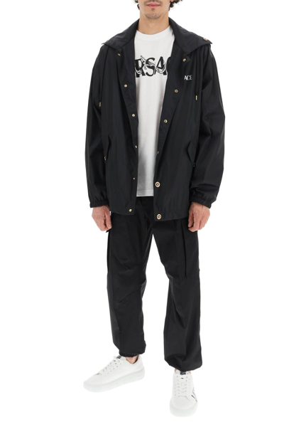 Shop Versace Light Windbreaker Jacket With Medusa Buttons In Black
