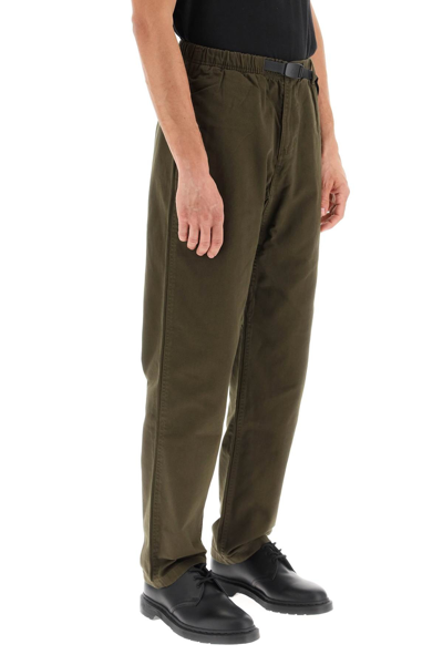 Shop Gramicci Pants In Khaki,green