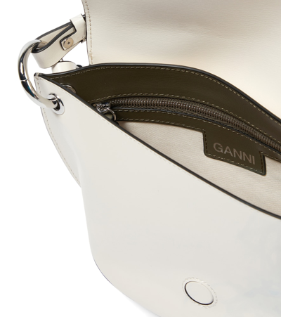 Shop Ganni Banner Saddle Leather Crossbody Bag In Egret