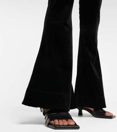 Shop Ganni Flared Velvet Pants In Black