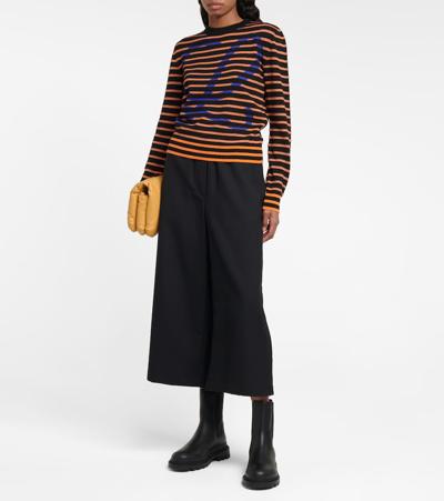 Shop Loewe Logo Striped Wool Sweater In Black/orange