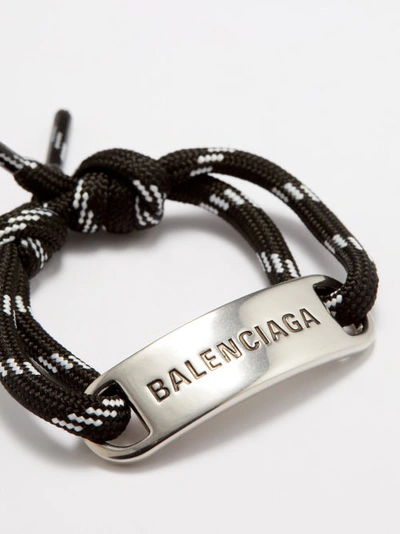Balenciaga Plate Logo-engraved Corded Bracelet In Nero Bianco | ModeSens