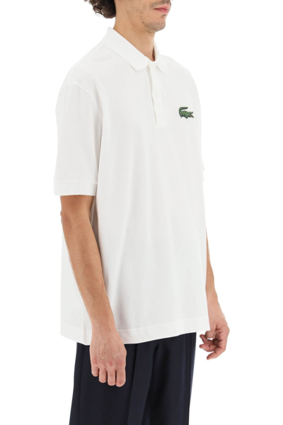 Shop Lacoste Maxi Logo Loose Fit Polo Shirt In White