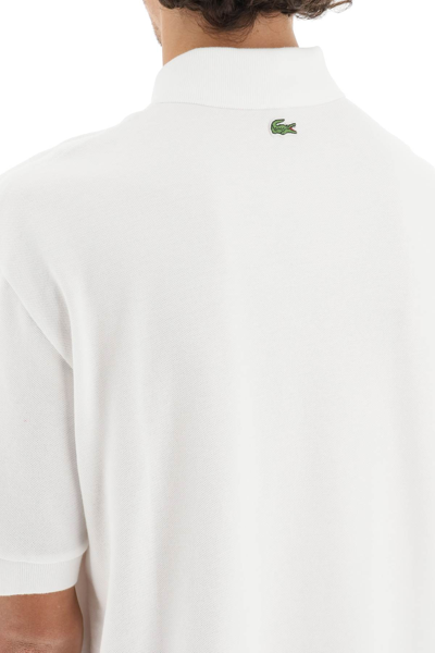 Shop Lacoste Maxi Logo Loose Fit Polo Shirt In White