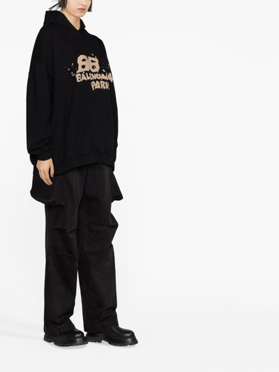 Shop Balenciaga Graffiti-logo Cotton Hoodie In Black