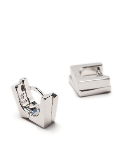 Shop Tom Wood Step Huggie Earrings In Silver