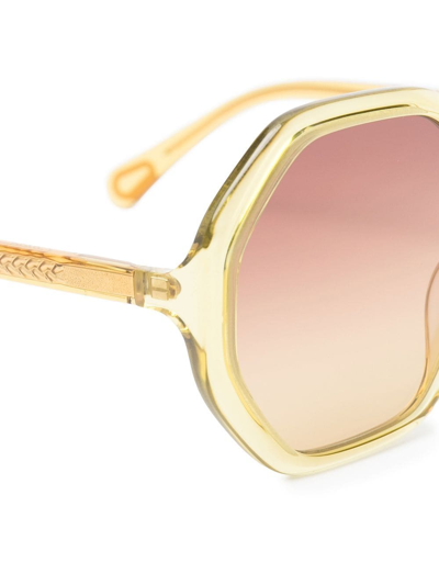 Shop Chloé Round Frame Sunglasses In Yellow