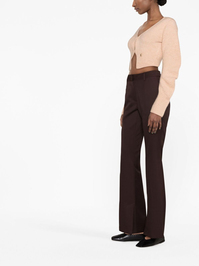 Shop Low Classic Flared-leg Trousers In Red