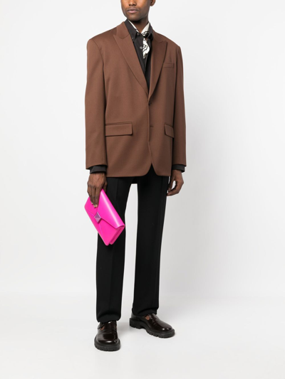 Shop Valentino Rockstud Clutch Bag In Pink