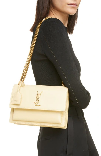 Shop Saint Laurent Medium Sunset Leather Shoulder Bag In Light Vanilla