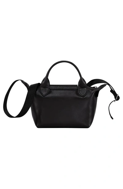 Shop Longchamp Extra Small Le Pliage Cuir Leather Top Handle Bag In Black