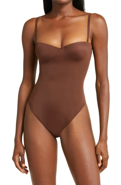 Skims Contour Lift Thong Bodysuit In Cocoa