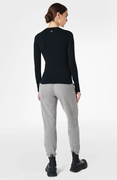 Shop Sweaty Betty Glisten Seamless Long Sleeve Top In Black