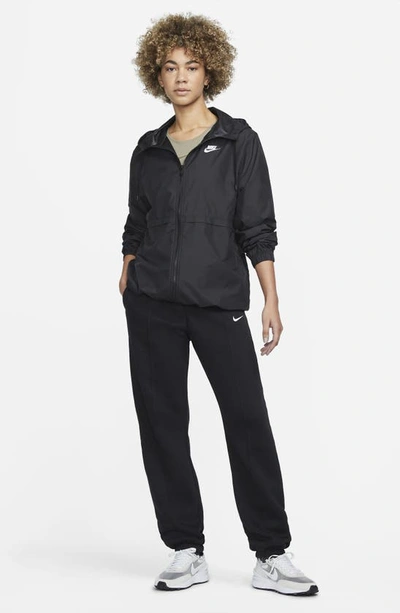 Shop Nike Repel Water-resistant Windbreaker Jacket In Black/ White
