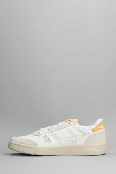 Shop Reebok Lt Court Sneakers In White Leather