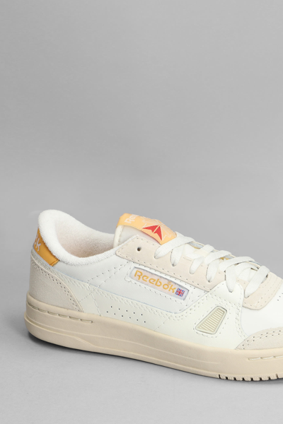 Shop Reebok Lt Court Sneakers In White Leather