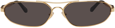 Shop Balenciaga Gold Oval Sunglasses In Gold-gold-grey
