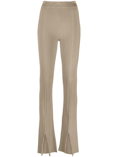 Shop Nanushka Slit-front Ribbed Slim Trousers In Neutrals