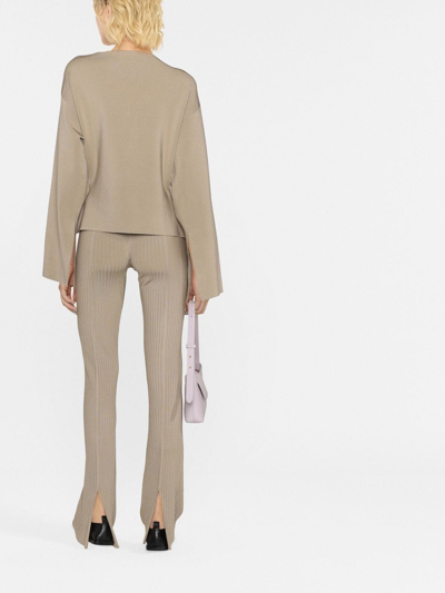 Nanushka Slit-front Ribbed Slim Trousers In Neutrals