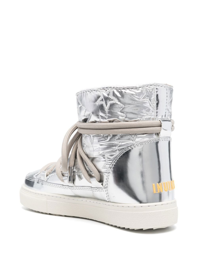 Shop Inuikii Metallic-effect Ski Boots In Silver