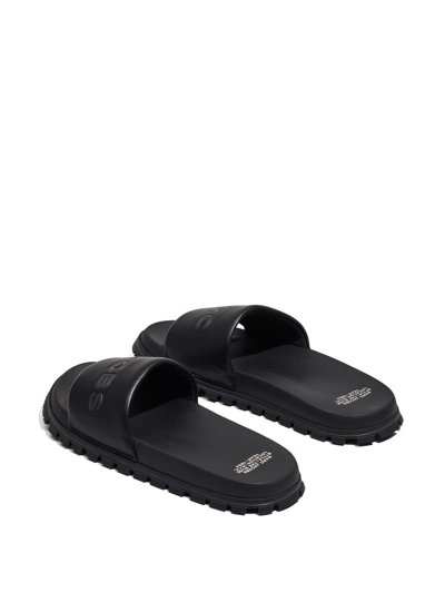 Shop Marc Jacobs The Leather Slide Logo-embossed Slides In Black