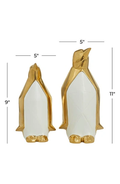 Cosmo By Cosmopolitan Set Of Two Penguin Sculptures In Gold