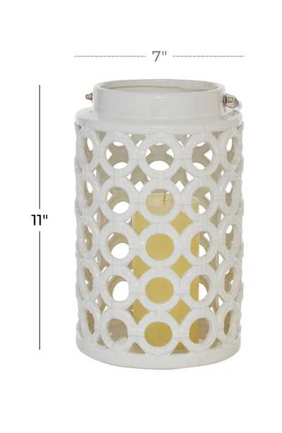 Ginger Birch Studio White Ceramic Circles Pillar Candle Lantern With Cut Out Design In White
