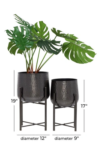 Cosmo By Cosmopolitan Iron Standing Planter In Black