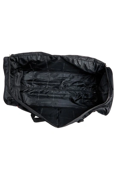 Shop Geoffrey Beene Jumbo 36" Duffle Bag In Black W/ Red