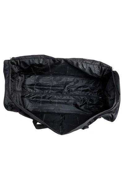 Geoffrey Beene Jumbo 36" Duffle Bag In Black W/ Red