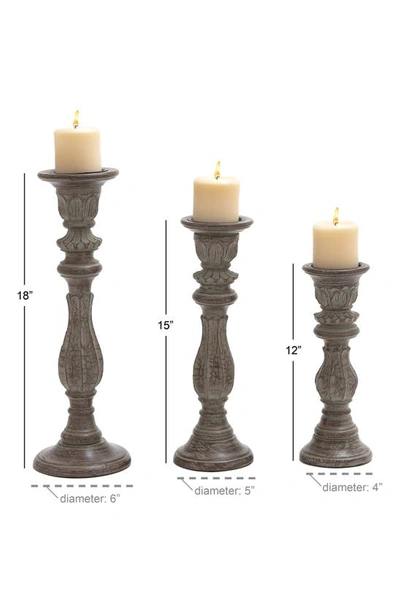 Uma Set Of 3 Distressed Mango Wood Candlesticks In Brown
