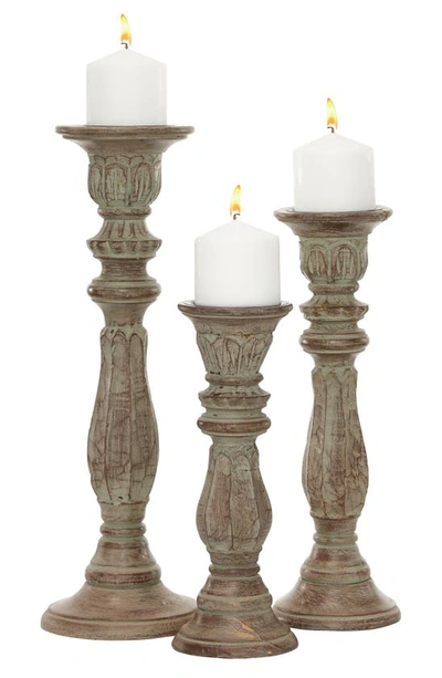 Uma Set Of 3 Distressed Mango Wood Candlesticks In Brown