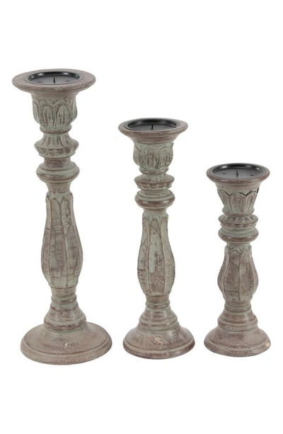 Uma Set Of 3 Distressed Mango Wood Candlesticks In Brown