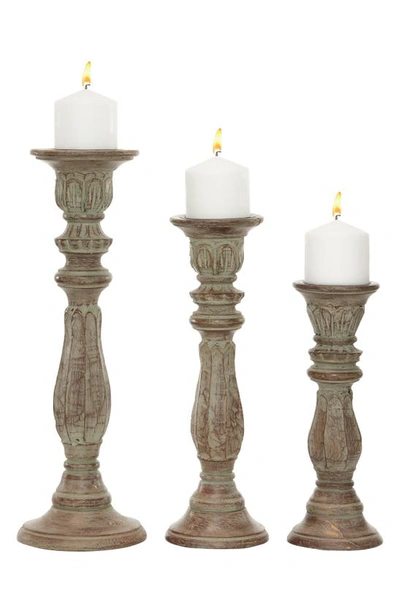 Uma Set Of 3 Distressed Mango Wood Candlesticks In Brown