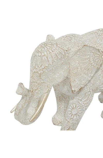 Ginger Birch Studio Carved Elephant Figure In White