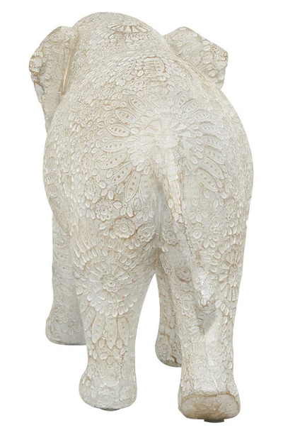 Ginger Birch Studio Carved Elephant Figure In White