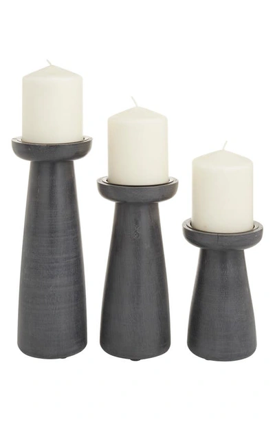 Shop Cosmo By Cosmopolitan Dark Gray Mango Wood Pillar Candle Holder In Black