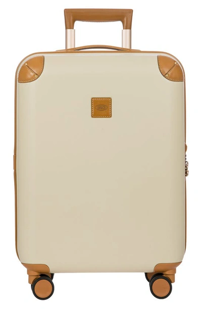 Shop Bric's Amalfi 21" Carry-on Spinner Suitcase In Cream/ Tan
