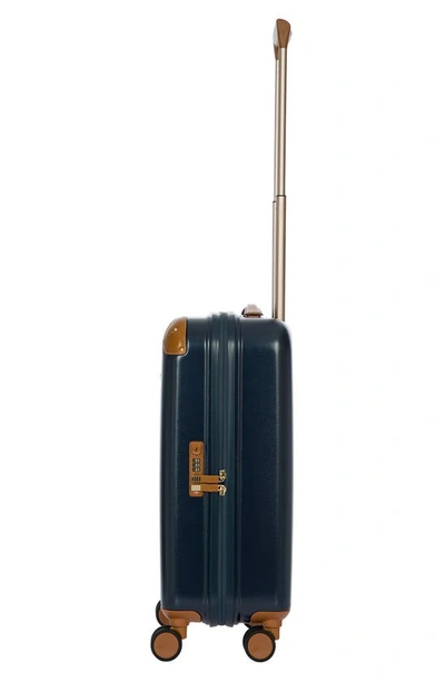 Shop Bric's Amalfi 21" Carry-on Spinner Suitcase In Blue/ Tan
