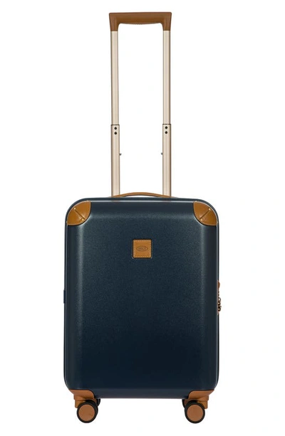 Shop Bric's Amalfi 21" Carry-on Spinner Suitcase In Blue/ Tan