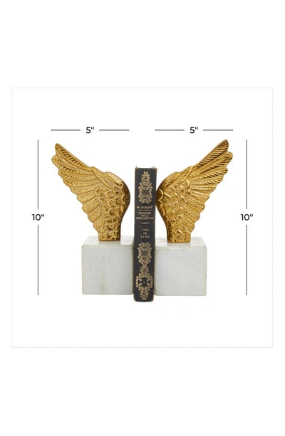 VIVIAN LUNE HOME VIVIAN LUNE HOME GOLDTONE ALUMINUM BIRD WINGS BOOKEND WITH MARBLE BASE 