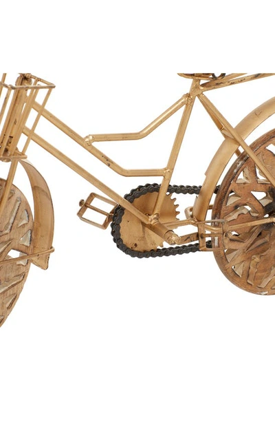 Willow Row Goldtone Metal Bike Sculpture With Carved Wood Wheels In Gold