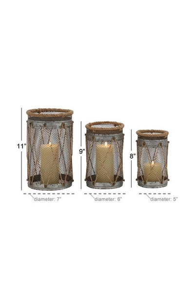 Shop Uma Silvertone Metal Pillar Candle Lantern In Gray