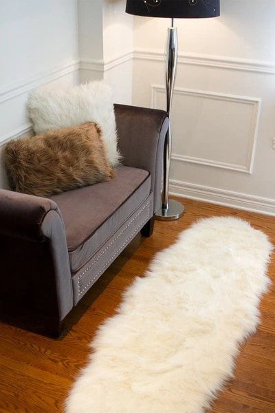 Shop Luxe Gordon Faux Sheepskin Throw In Off White